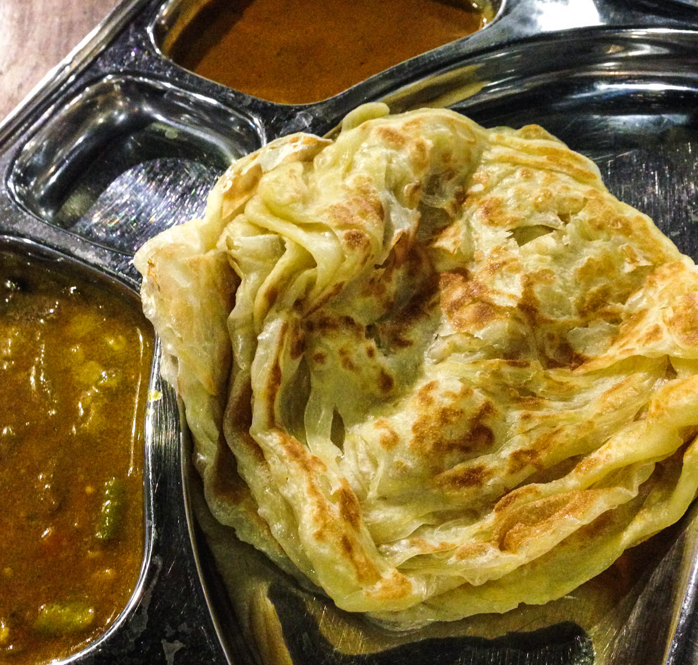 Roti Canai with dhal and curry, Malaysia