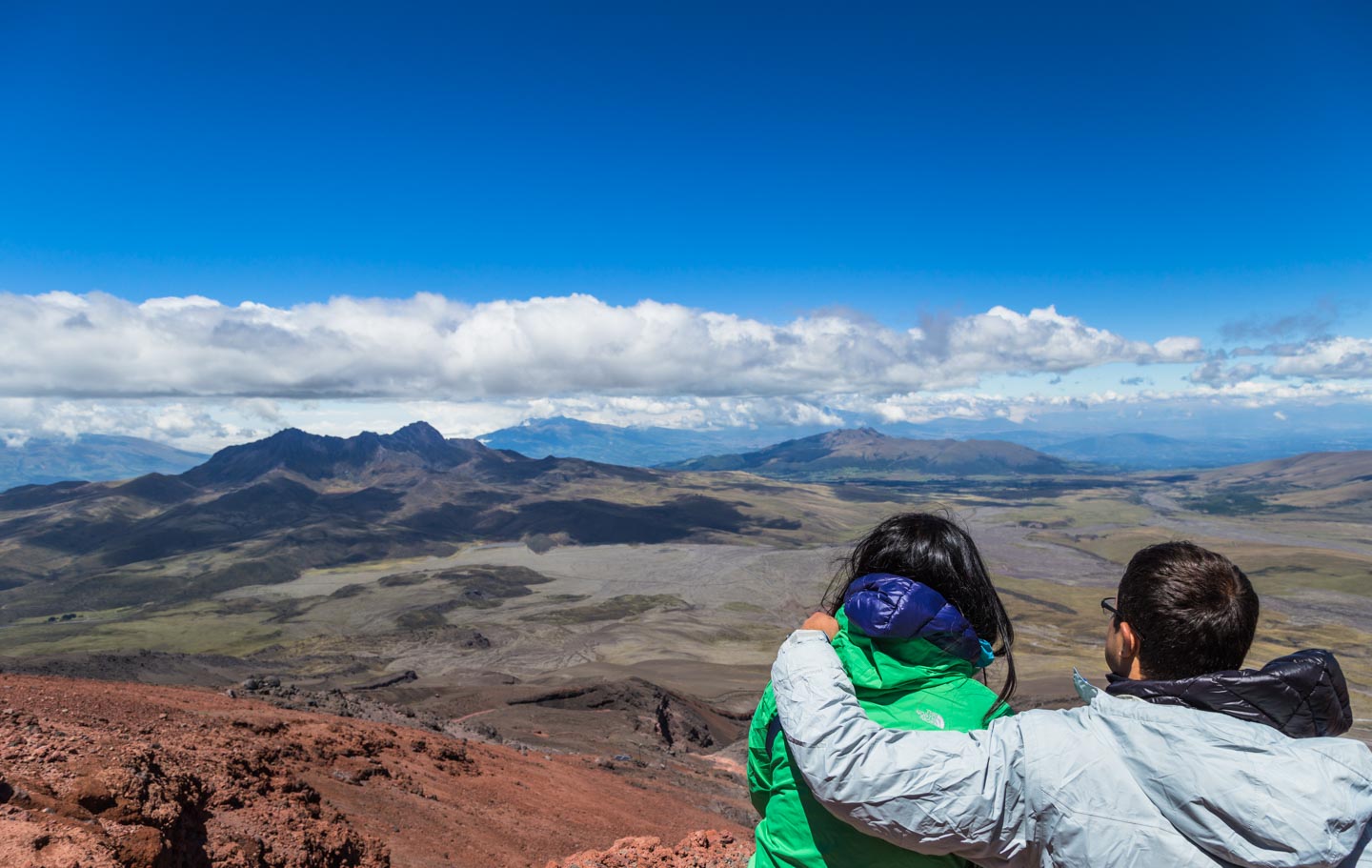 Julie and Carlos admiring the view of Cotopaxi National Park at 5,000 meters (16,404 ft), Cotopaxi National Park, Ecuador