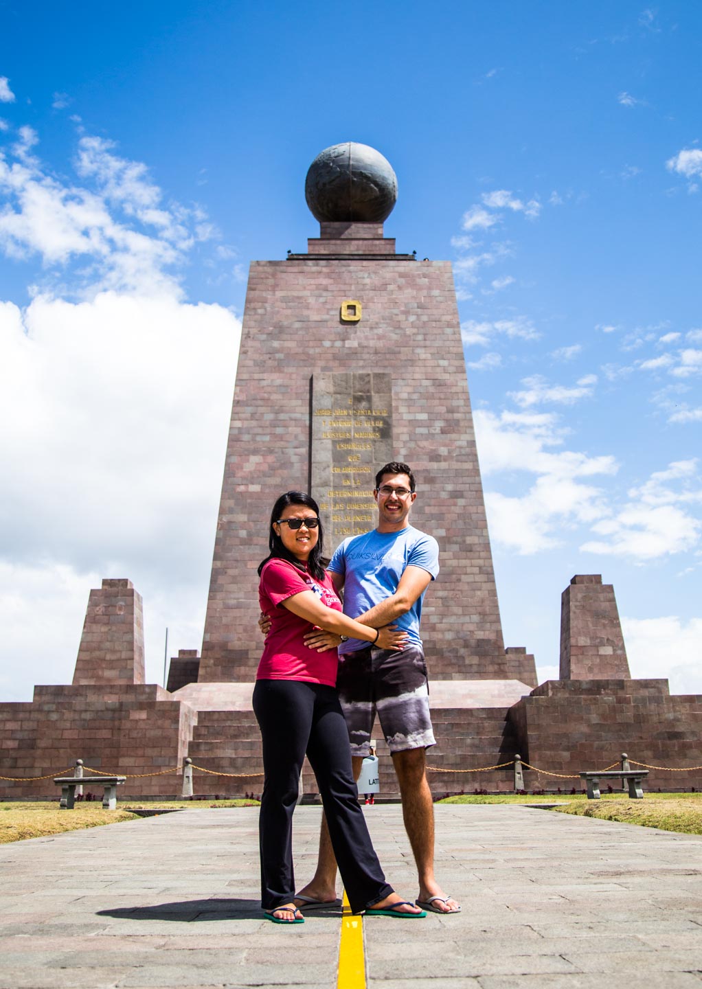 Julie and Carlos meeting half way at the Equator line, Quito, Ecuador