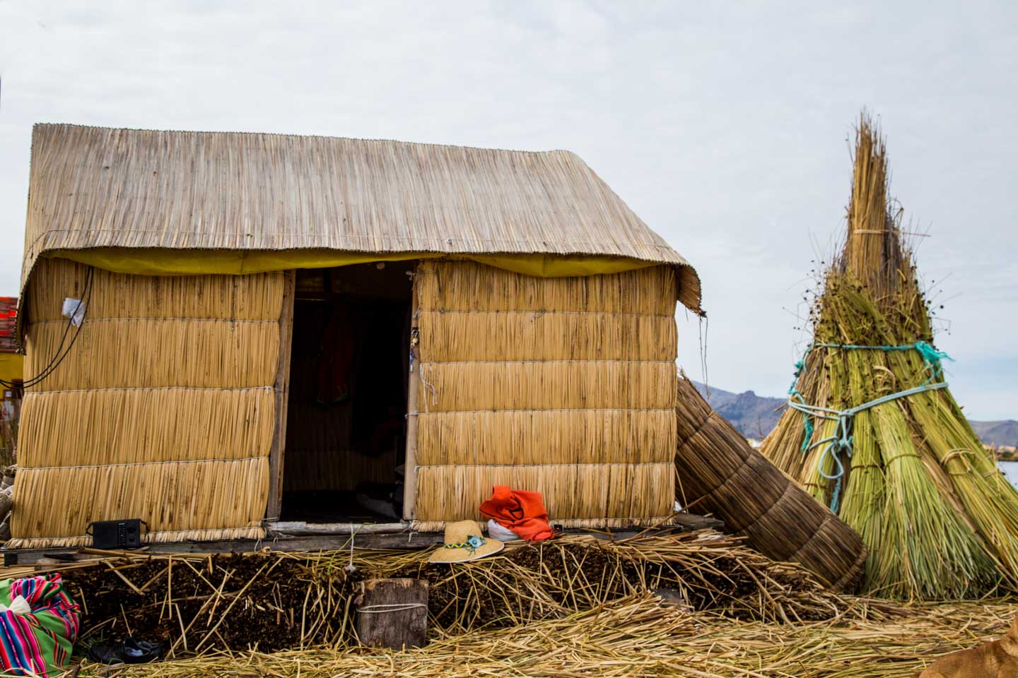 Wooden house on Uros Islands, Lake Titicaca, Peru