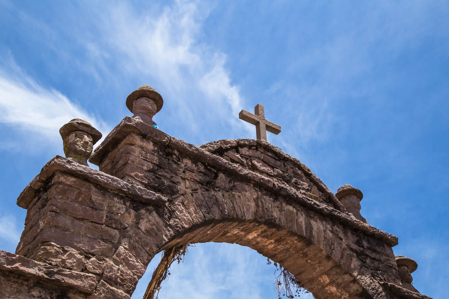 Stone arch on Taquile Island, Lake Titicaca, Peru
