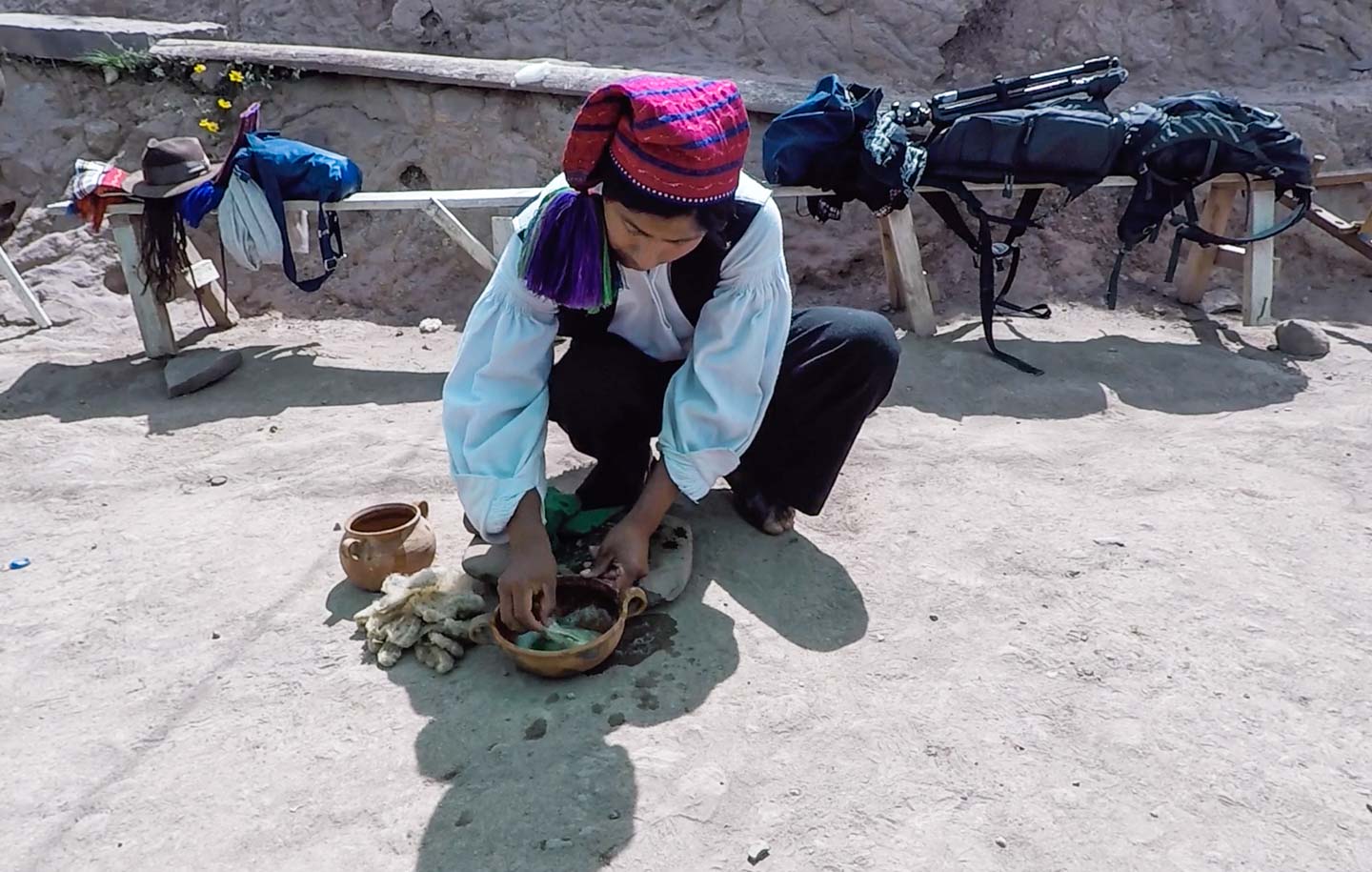 A married Taquile man cleaning the alpaca wool, Taquile Island, Lake Titicaca, Peru