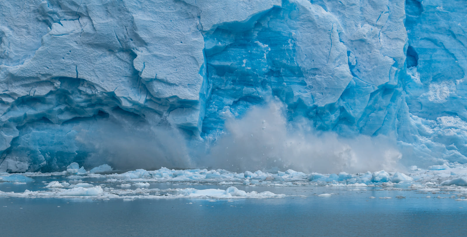 Splash caused by falling ice chunk, Los Glaciares, Argentina.
