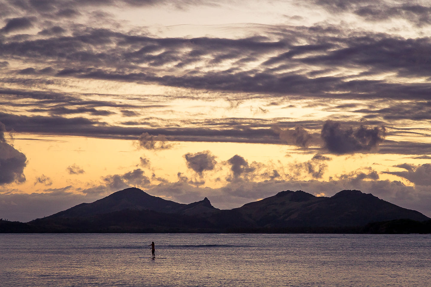 Paddleboarding at sunset, Yasawa Islands, Fiji