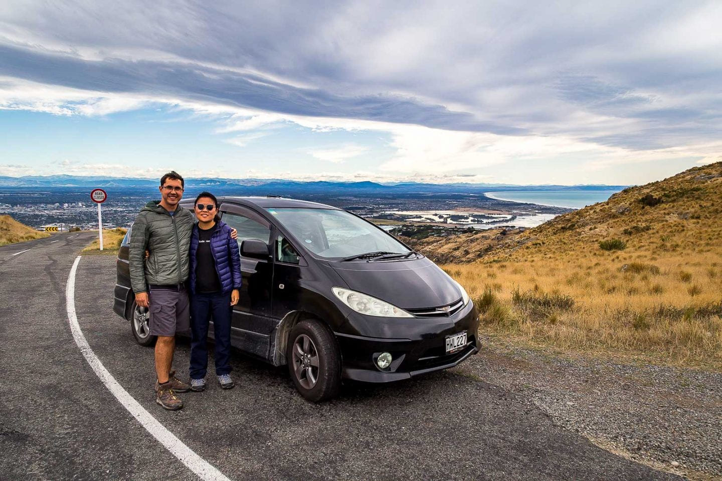 Julie & Carlos with their van in Christchurch, South Island, New Zealand