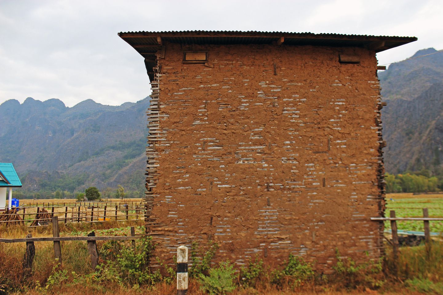 Bamboo and clay hut, Konglor Village, Laos