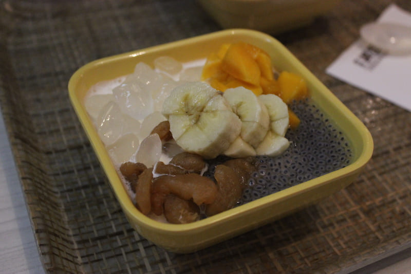 Bananas, mangoes, longan, and dragonfruit eyes in vanilla at Honeymoon Desserts.