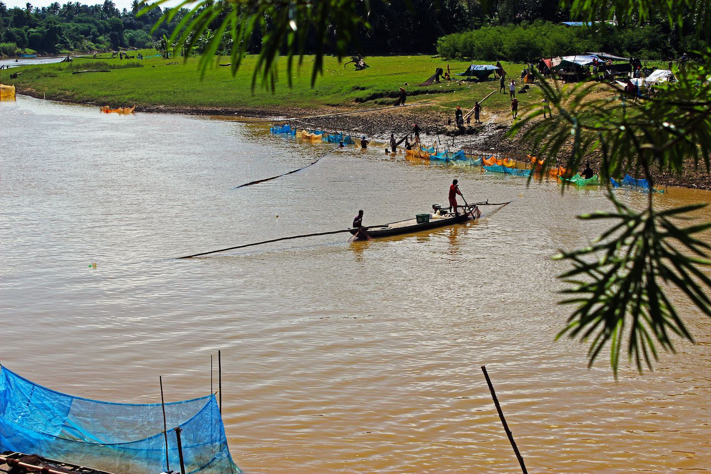 Boat with the river-wide net