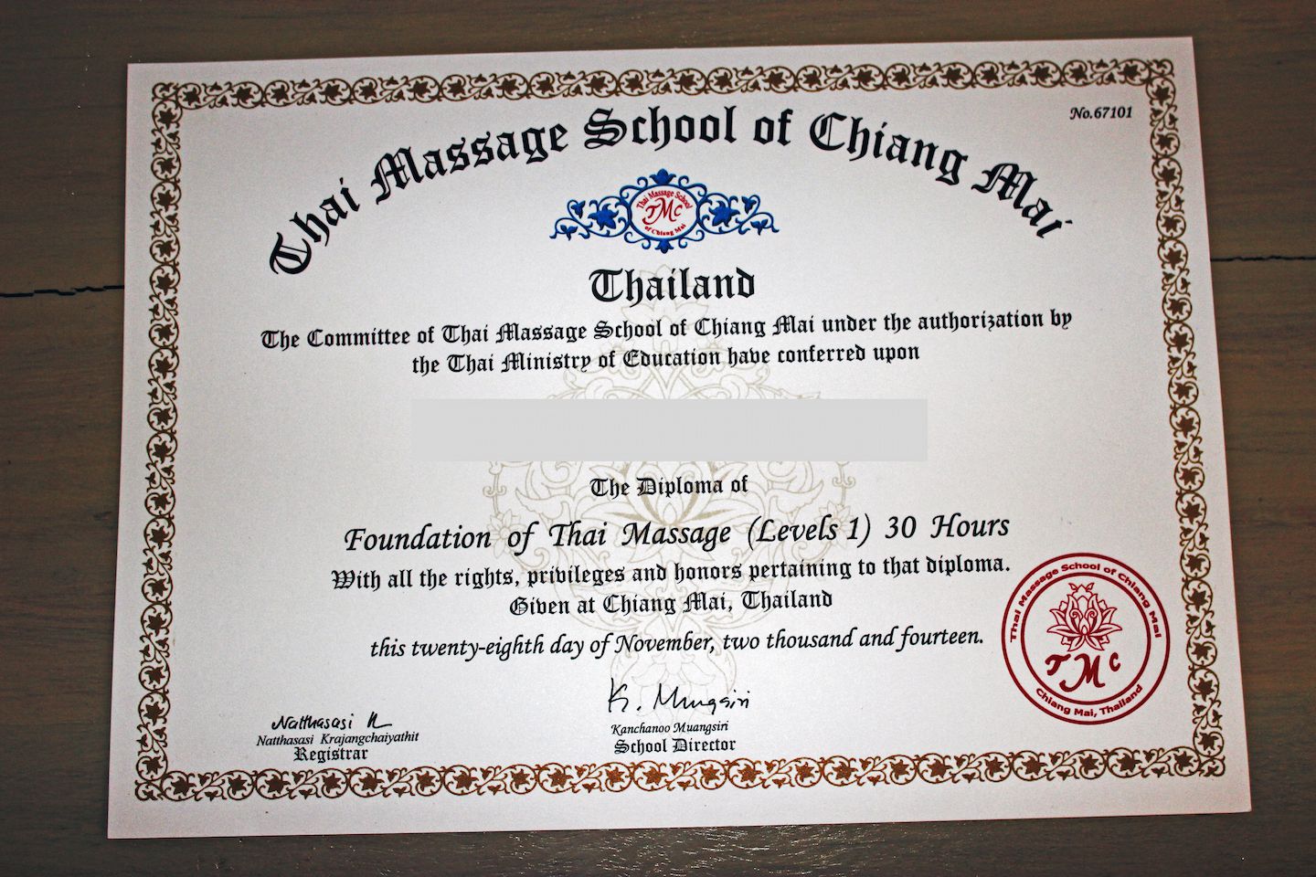 Carlos' diploma from the Thai Massage School of Chiang Mai (name blurred)