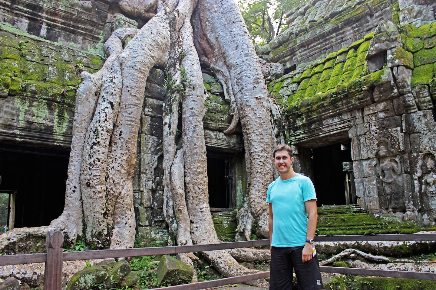 Carlos next to the tree at Ta Prohm