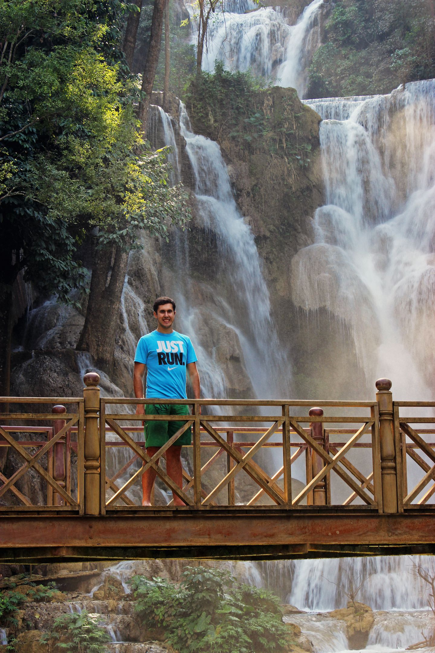 Carlos on the bridge overlooking the Kuang Si Waterfall, Luang Prabang, Laos