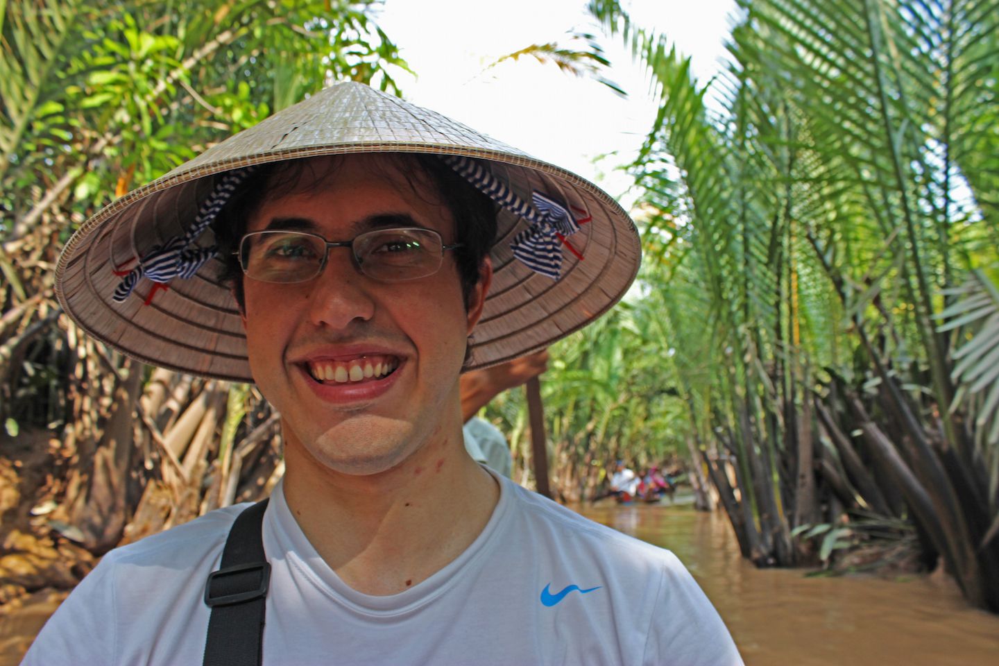 Carlos wearing a conical hat