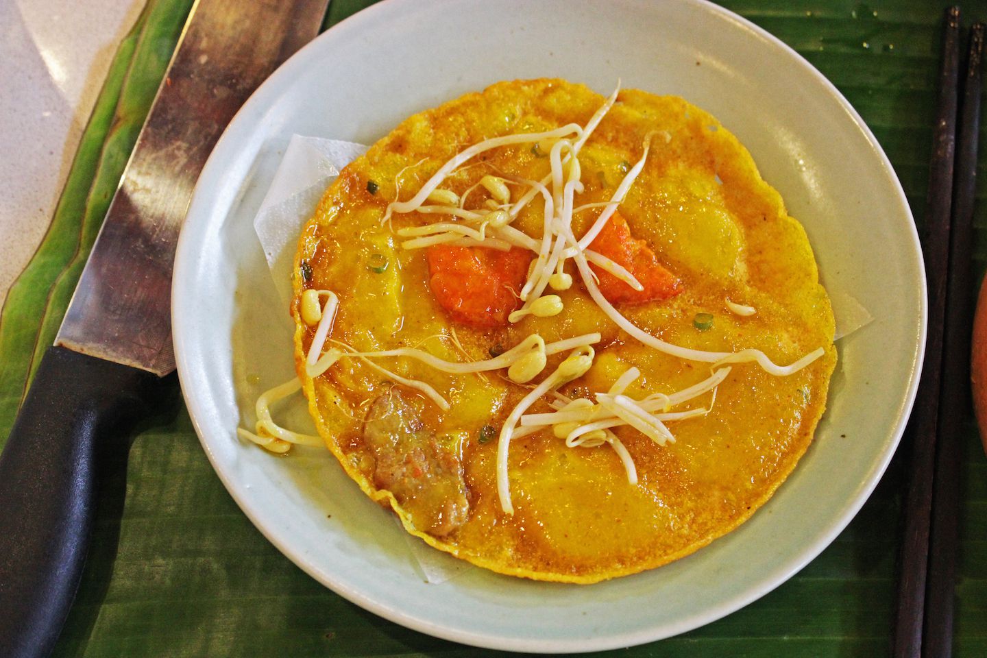 Crispy Hoi An pancakes with pork, prawns and bean sprouts