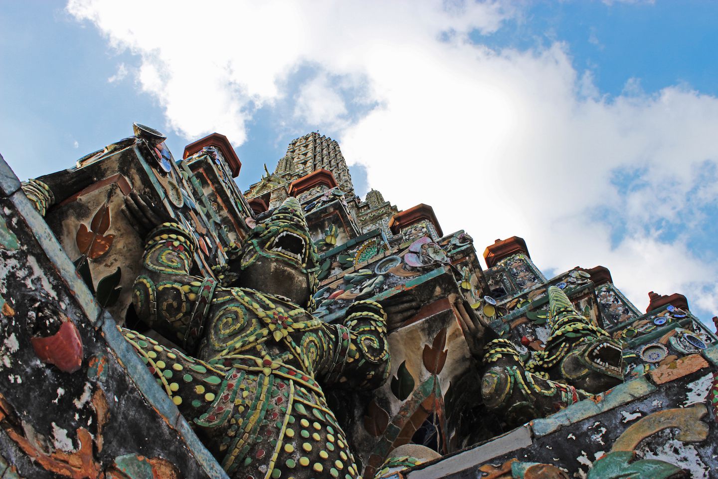 Demons holding the chedi at Wat Arun