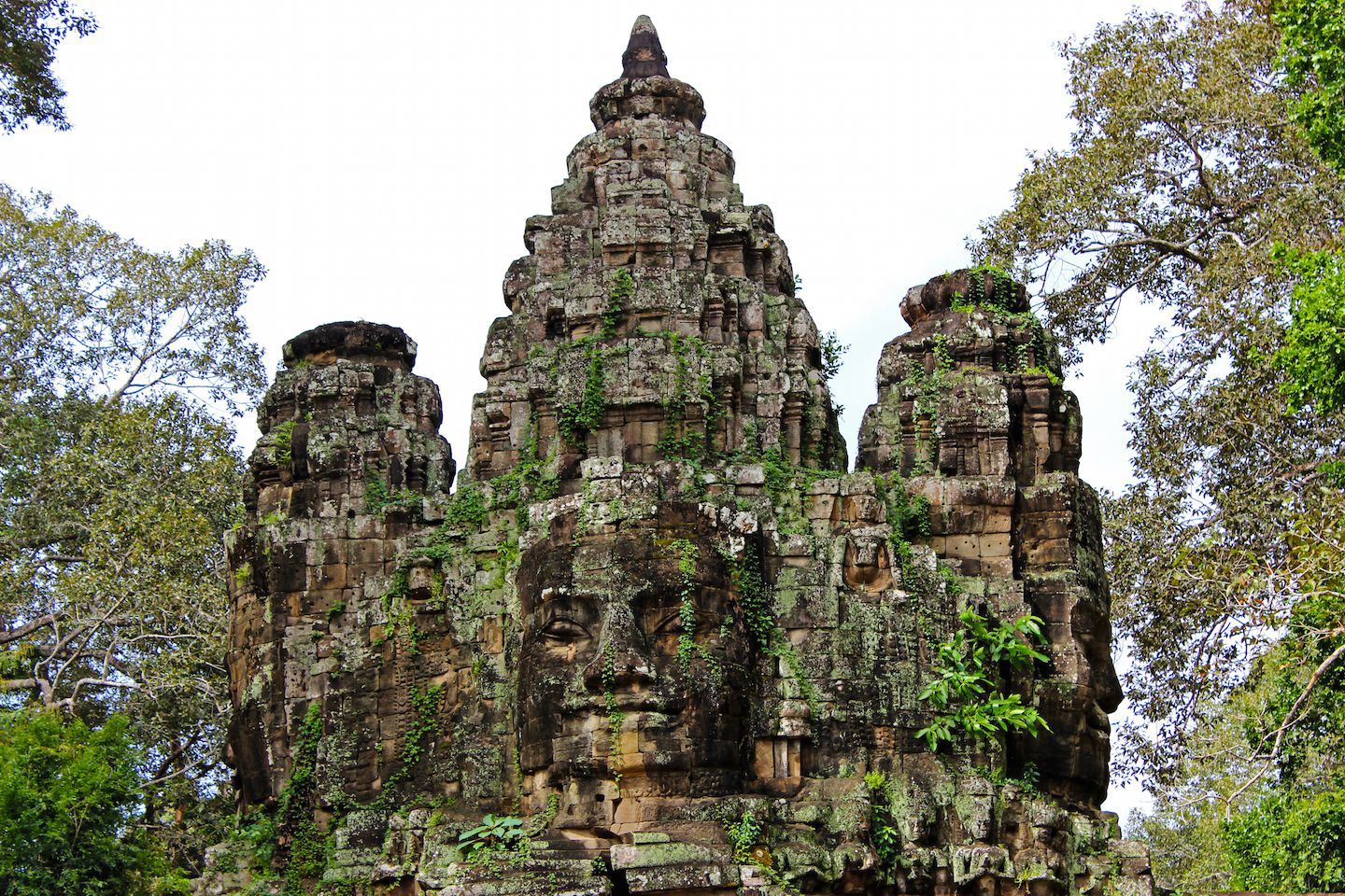 Faces on the top of the Victory Gate at Angkor Thom