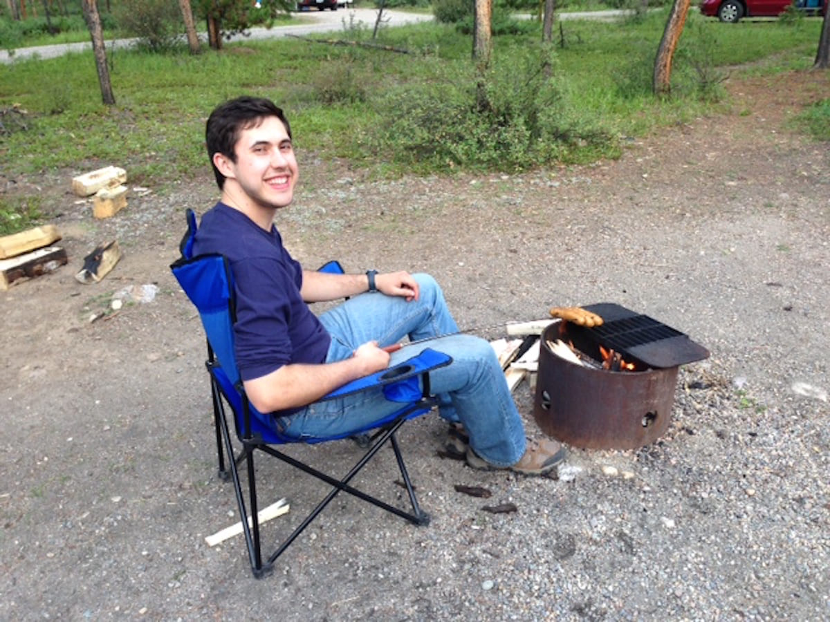 Grilling sausages on the campgrounds.