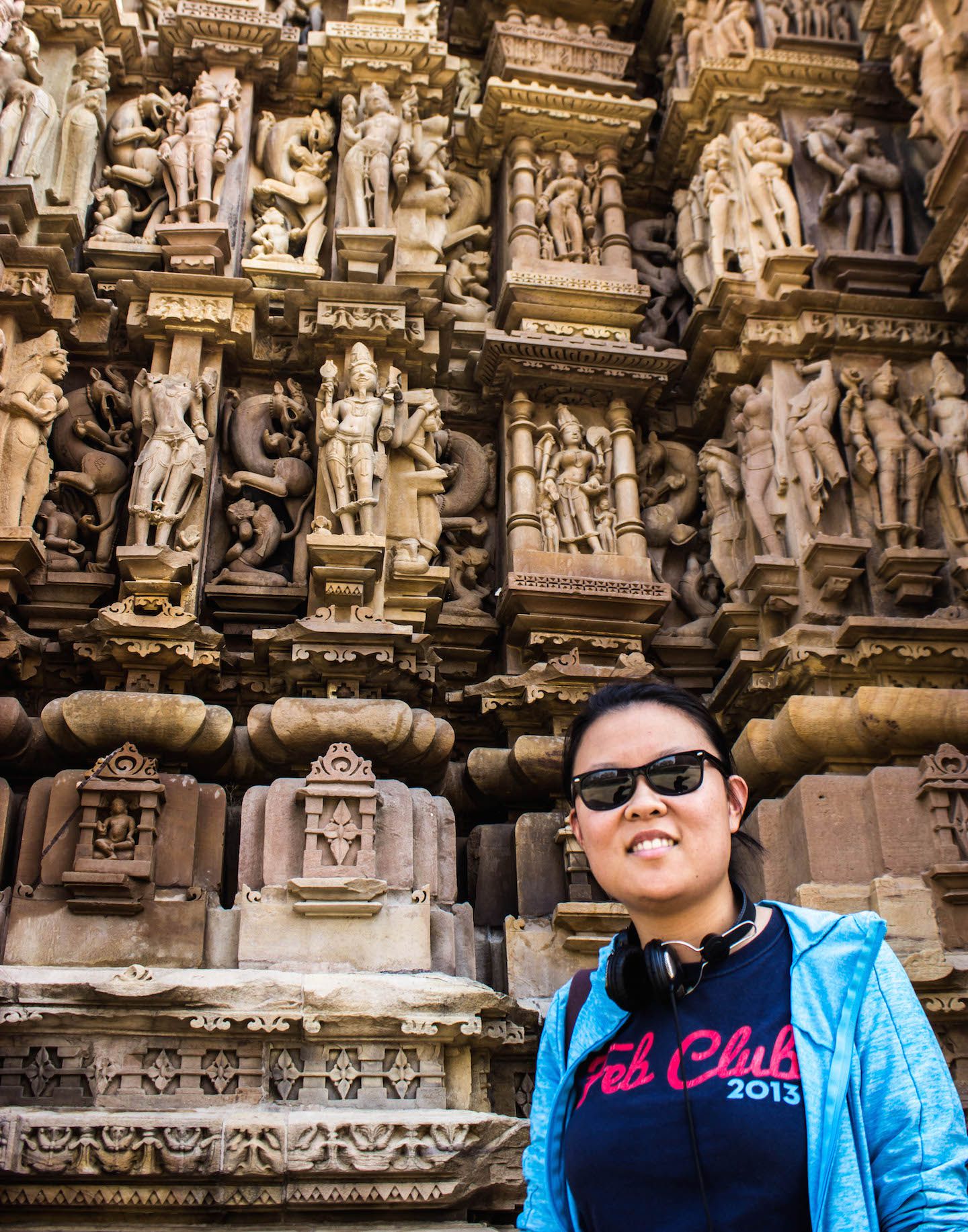 Julie and the erotic wall of the Kandariya-Mahadev, Khajuraho, India
