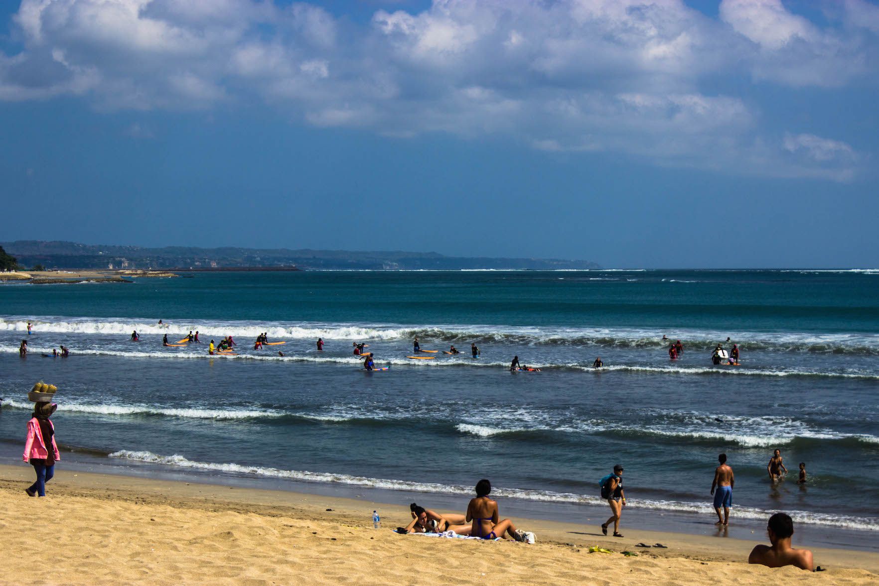 Horde of tourists learning how to surf, Kuta Beach, Bali, Indonesia
