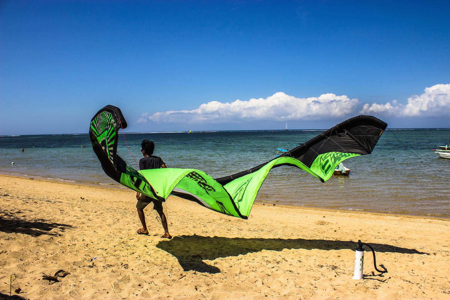 Setting up some kites at the Baby Reef Kitesurfing shop, Bali, Indonesia