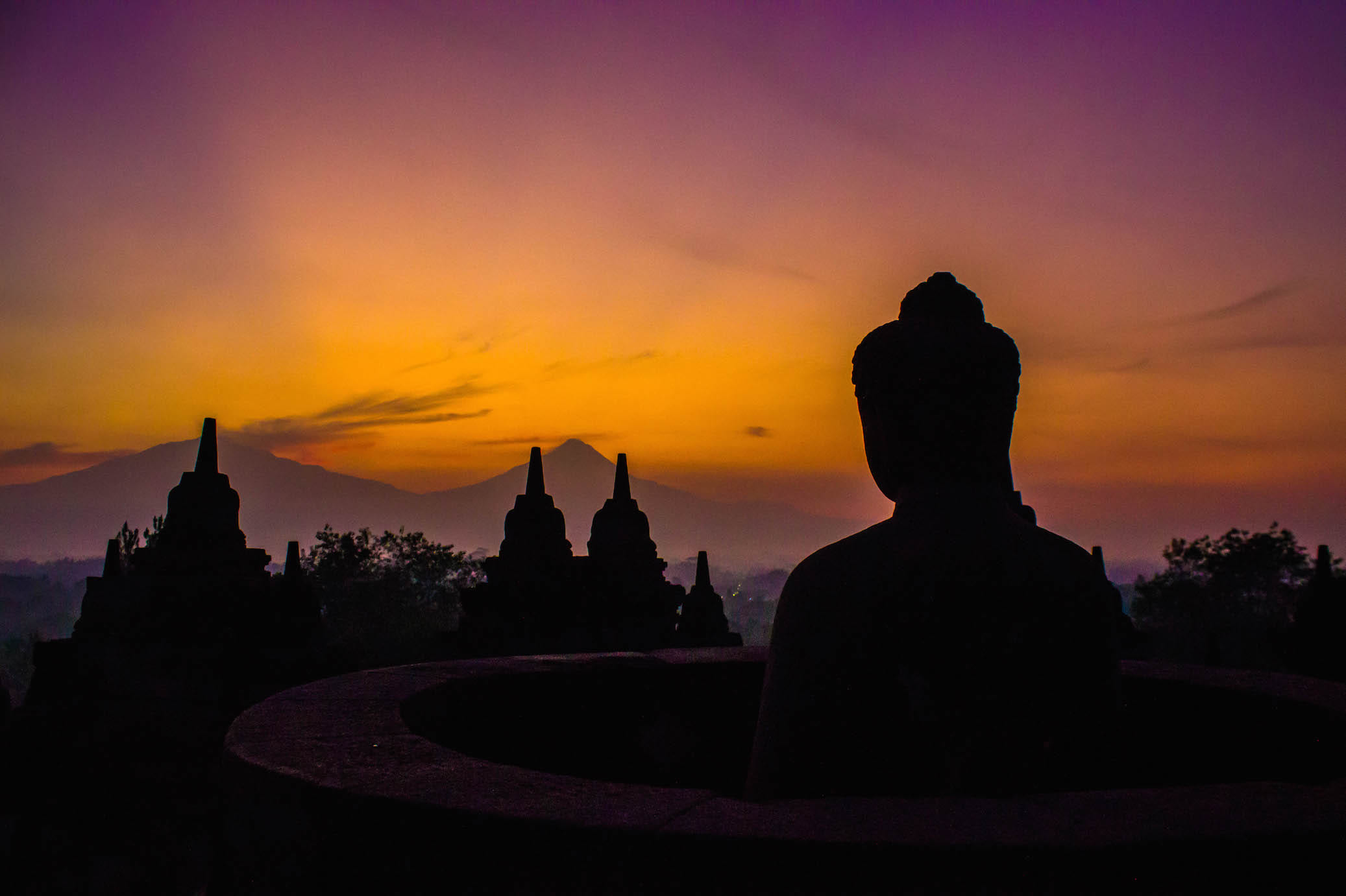 Buddha statue during sunrise, Borobudur, Indonesia