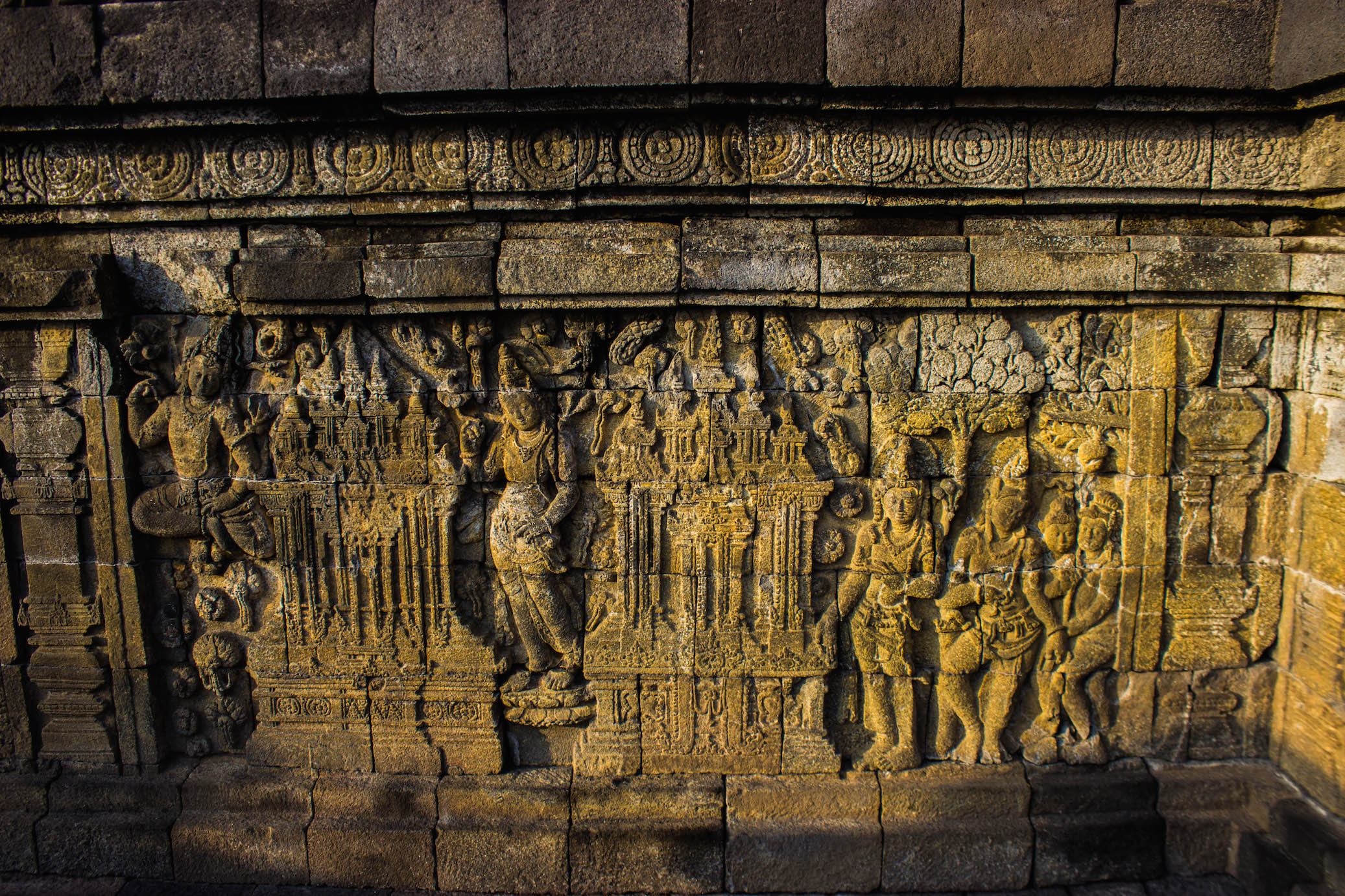Intricate carvings on the walls of Borobudur, Indonesia