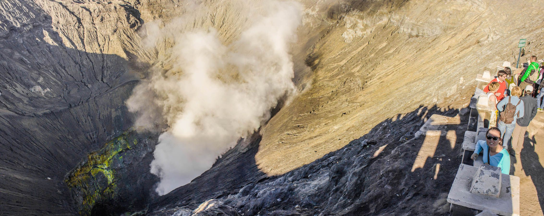Panoramic view with Julie and the crater of Mt. Bromo, Indonesia
