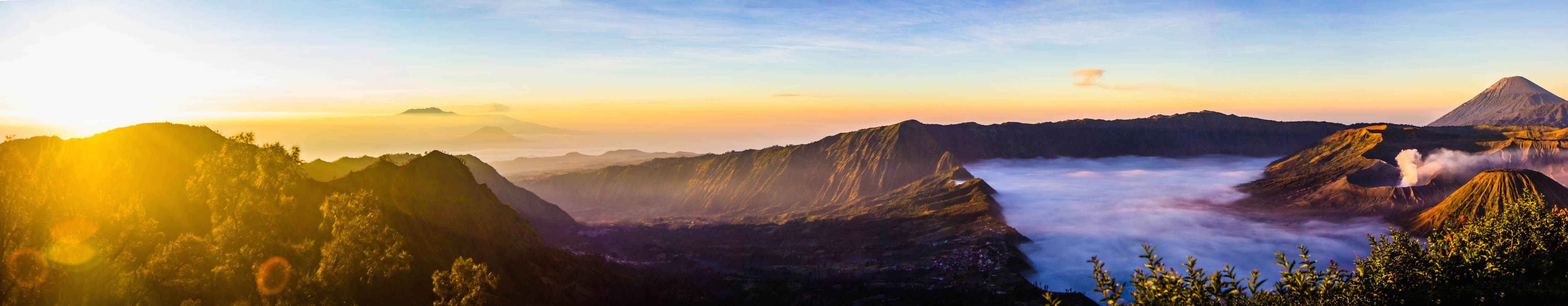 Panoramic view of Cemoro Lawang and Mt. Bromo during sunrise, Indonesia