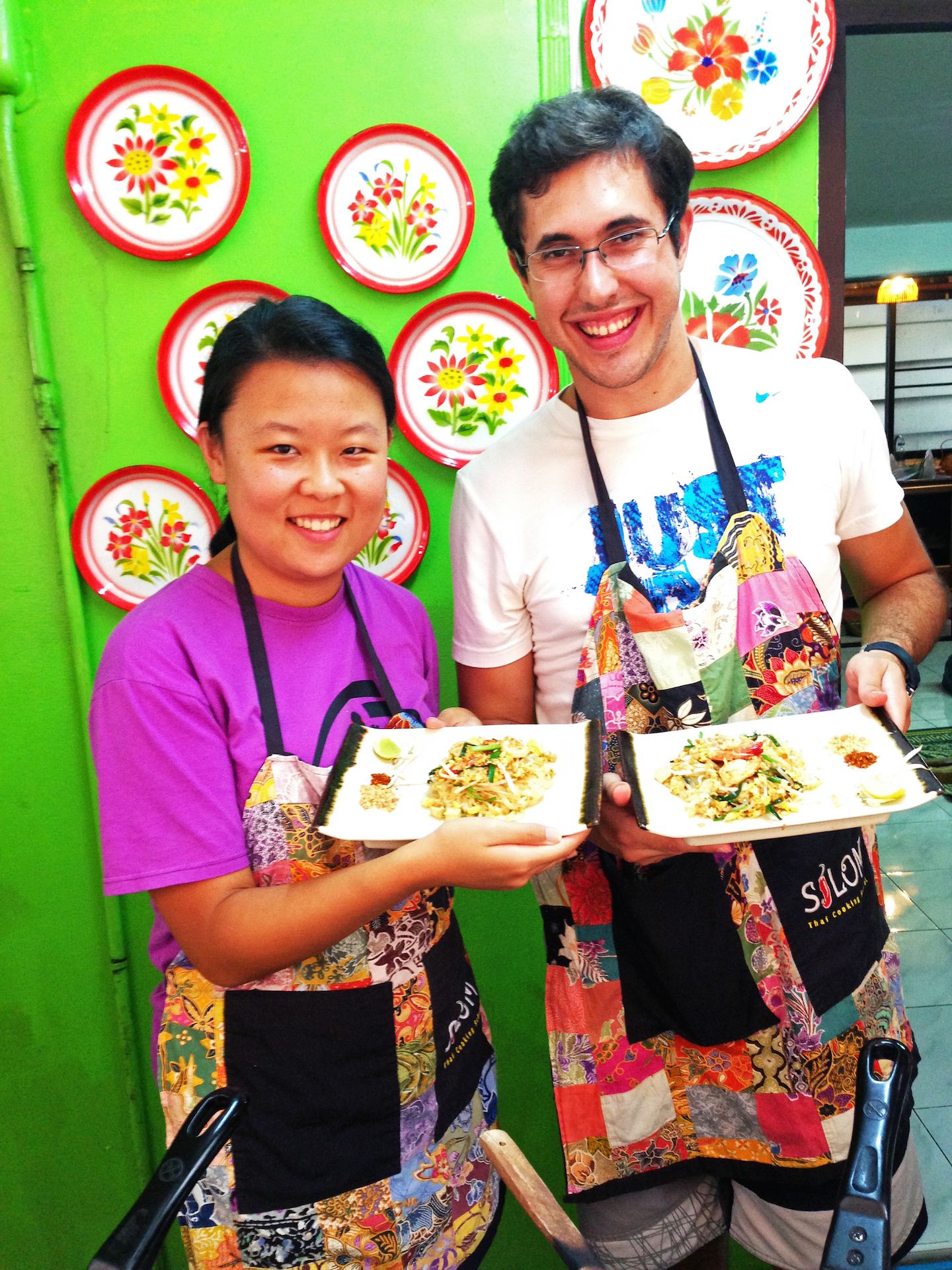 Julie and Carlos with their respective Pad Thais, Bangkok, Thailand