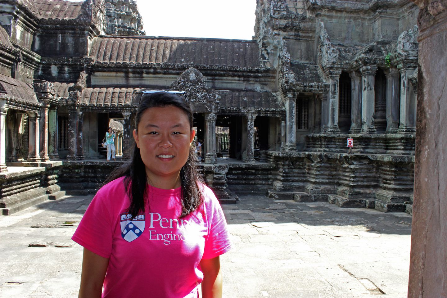 Julie at the top level of Angkor Wat
