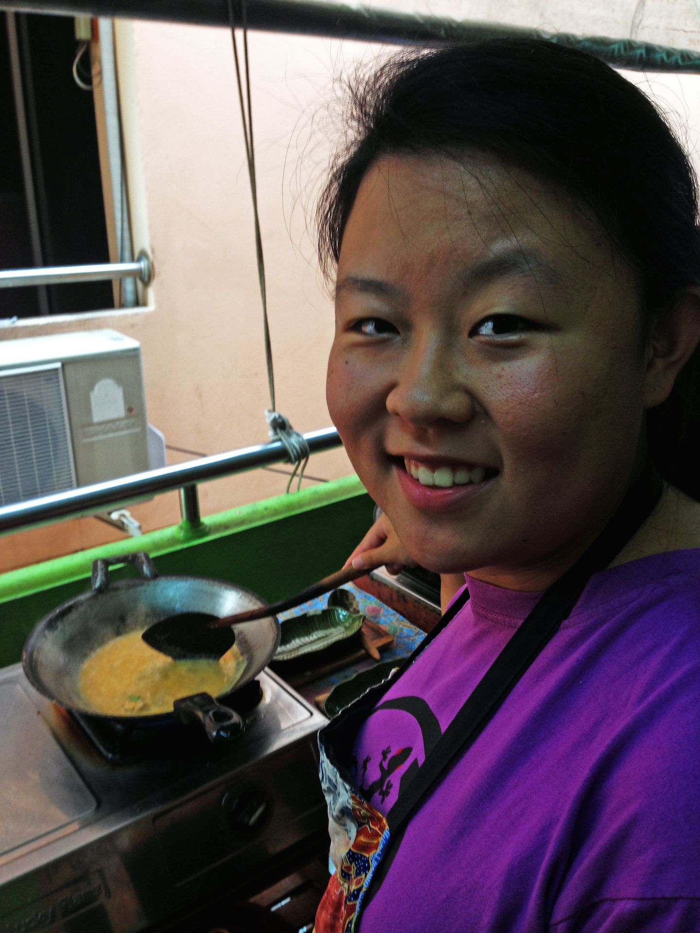 Julie cooking some Panang Curry, Silom Cooking School, Bangkok, Thailand