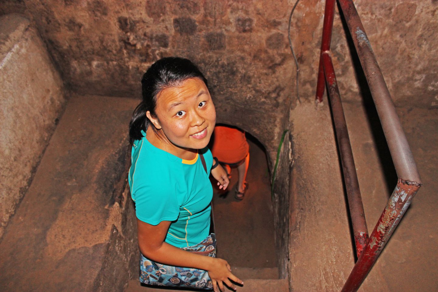 Julie going inside the tunnels