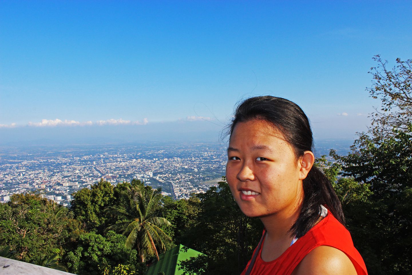 Julie overlooking Chiang Mai, at Wat Doi Suthep