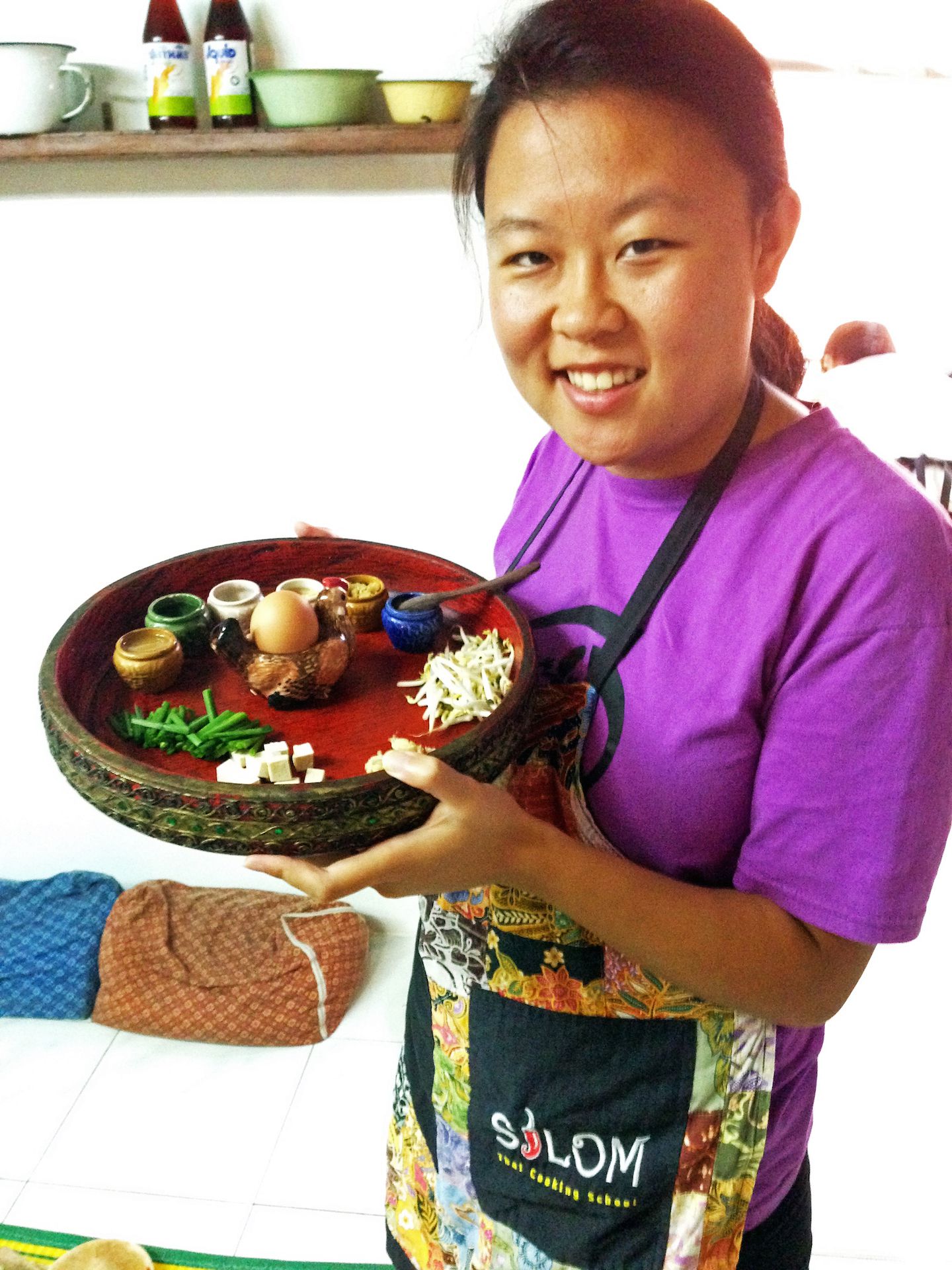 Julie ready to cook Pad Thai, Silom Cooking School, Bangkok, Thailand