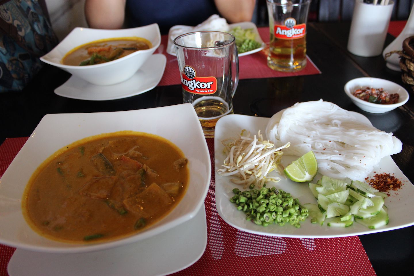 Khmer curry with noodles and side dishes