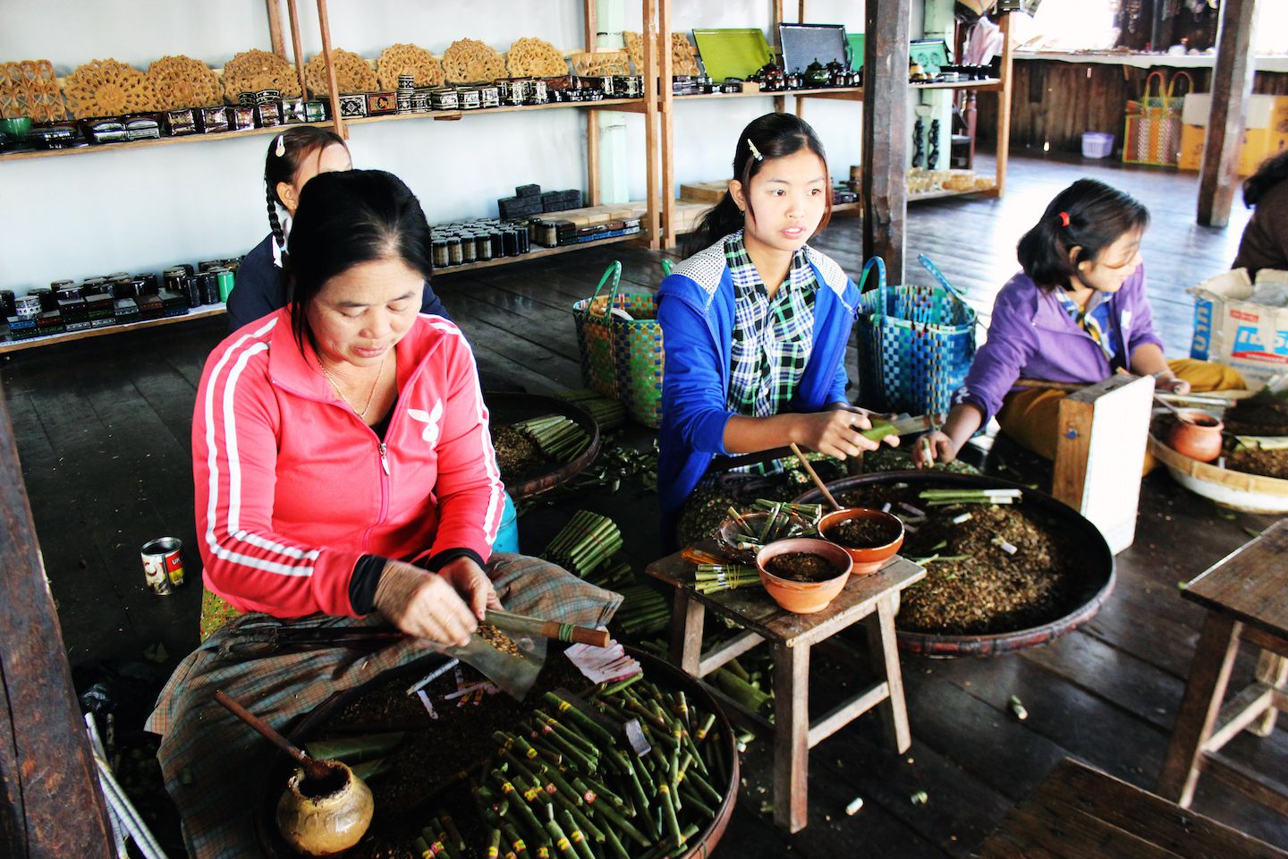 Ladies making sweet cigarettes, Inle Lake, Myanmar