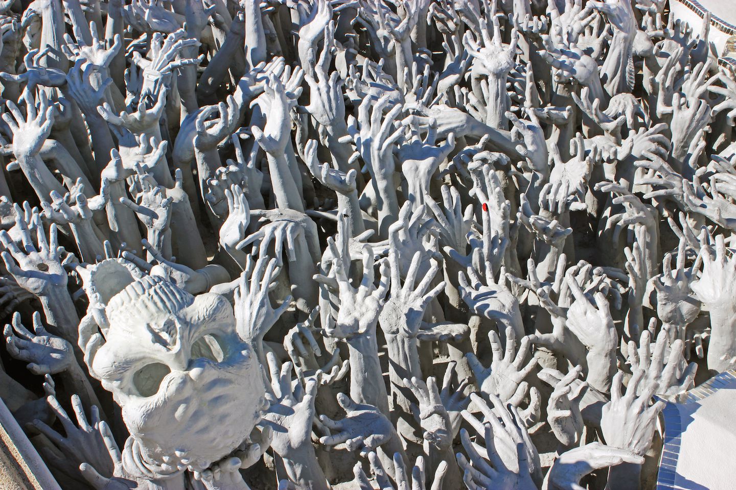 Lost souls asking for salvation at the White Temple in Chiang Rai