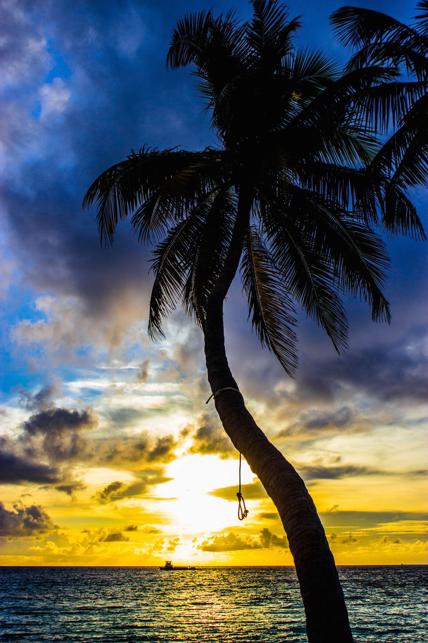 Sunset over the bikini beach on Maafushi Island, Maldives