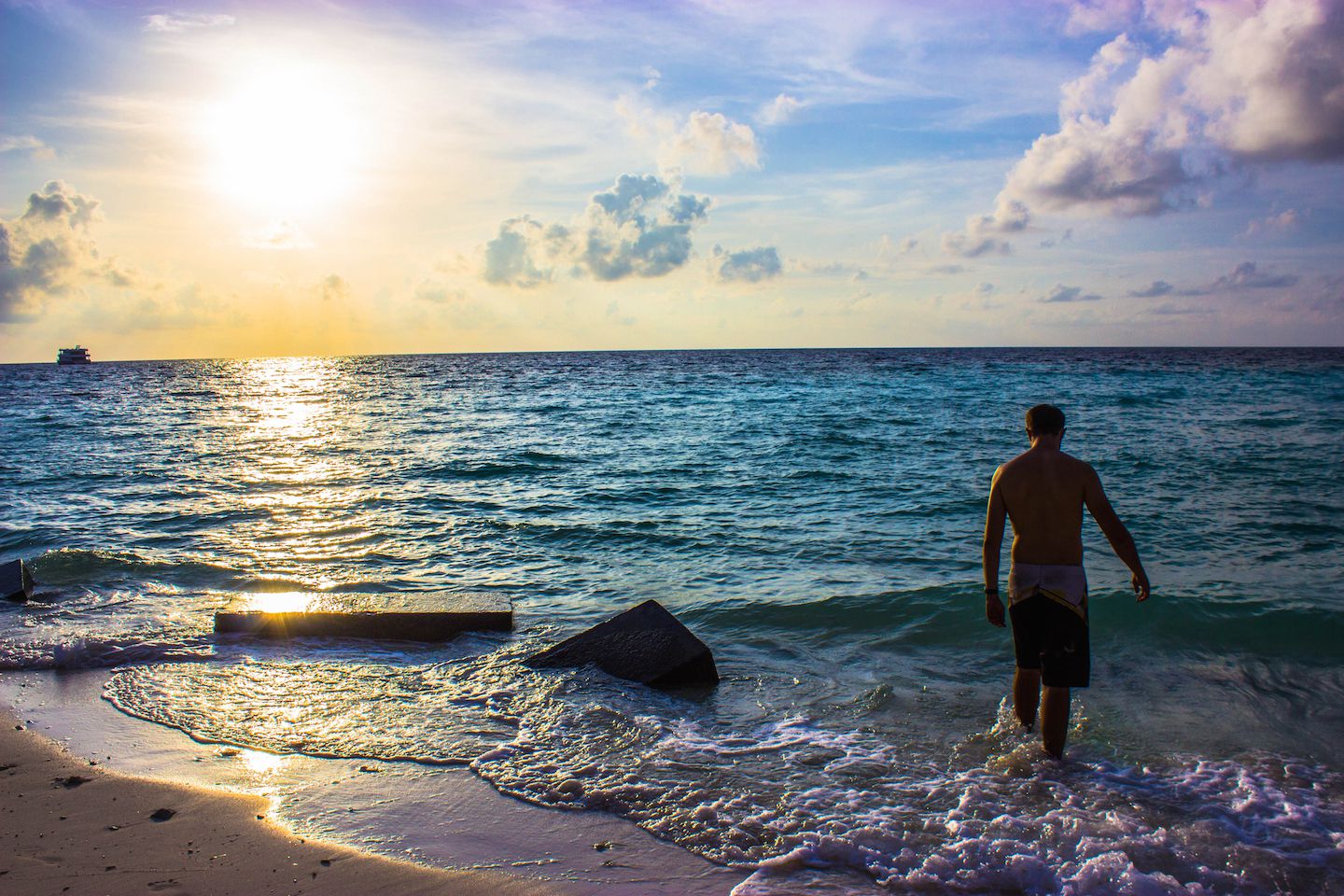 Carlos on the beach in Maafushi, Maldives