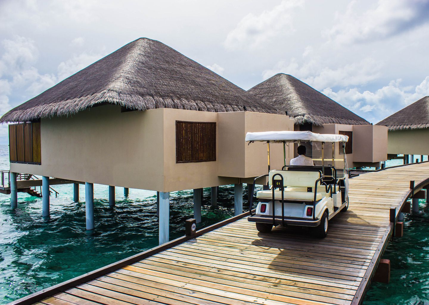 Golf cart heading to the water bungalows, Vadoo Resort, Maldives