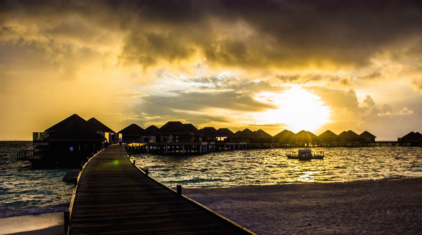 Sunset over the water bungalows, Vadoo Resort, Maldives