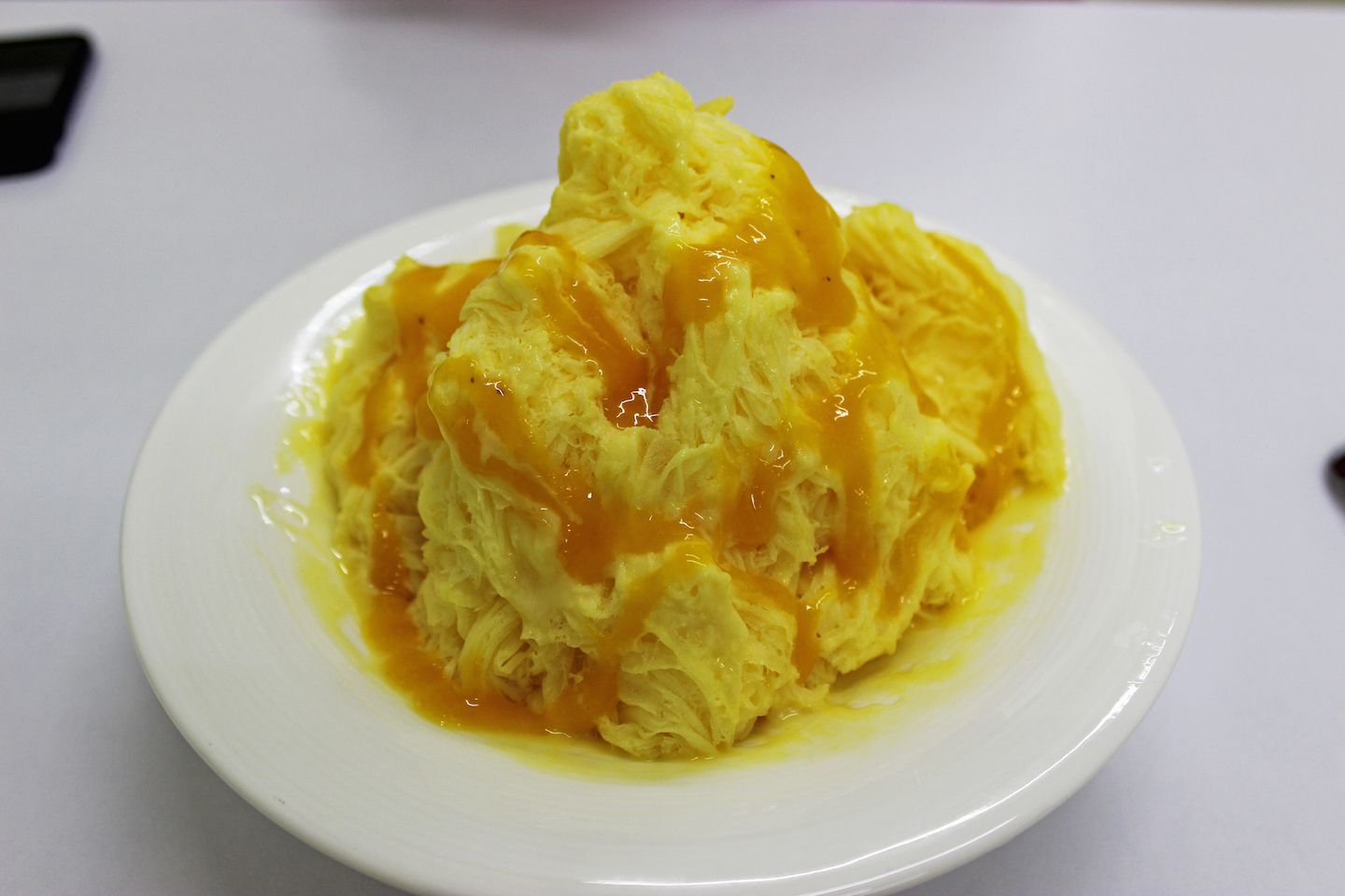 Mango shaved ice with mango syrup