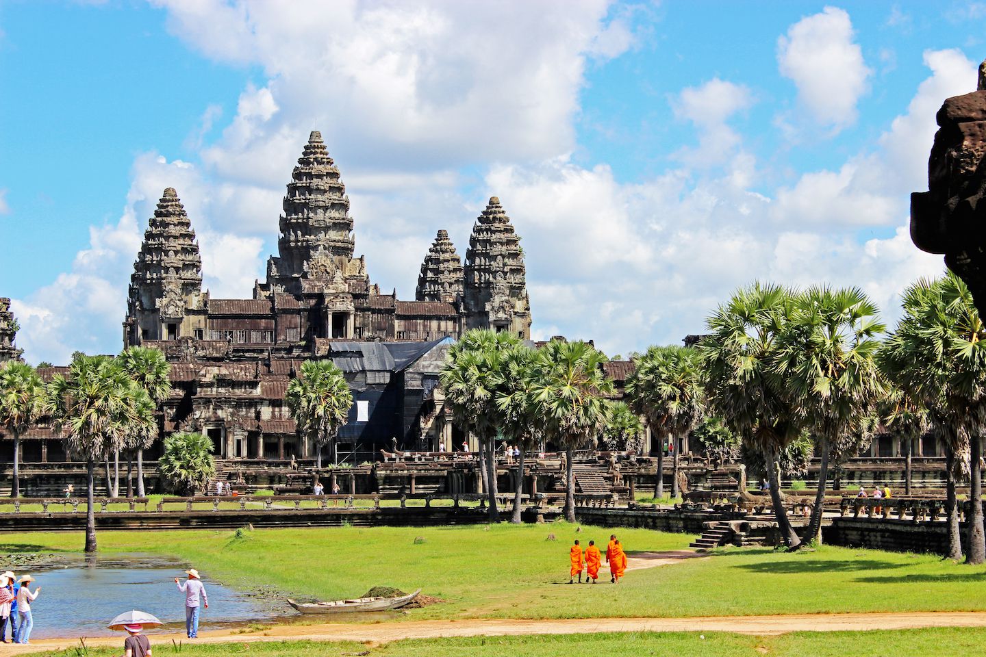 Monks walking into Angkor Wat
