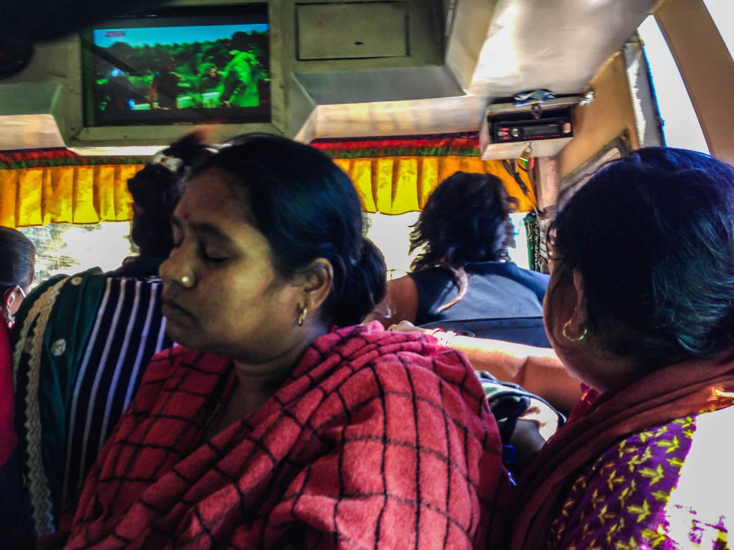 Locals sitting on us during the bus ride to Besisahar, Nepal