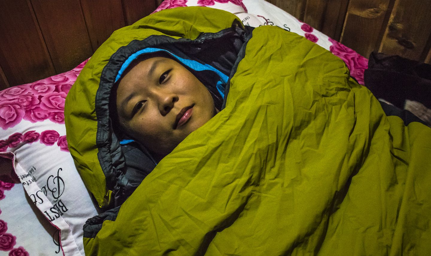Julie in her sleeping bag, Chame, Nepal