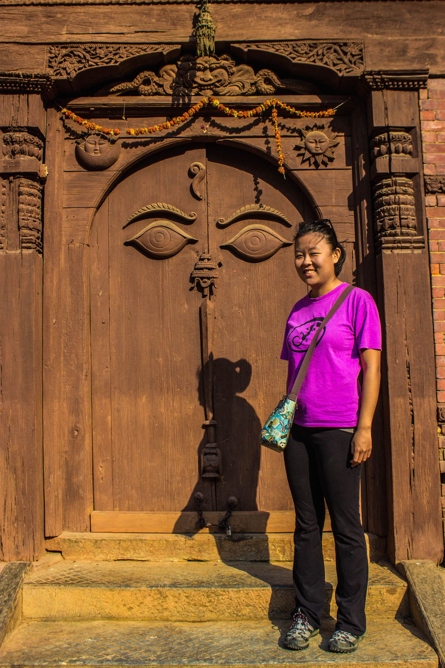 Julie and the Buddha eyes door, Kathmandu Durbar Square, Nepal