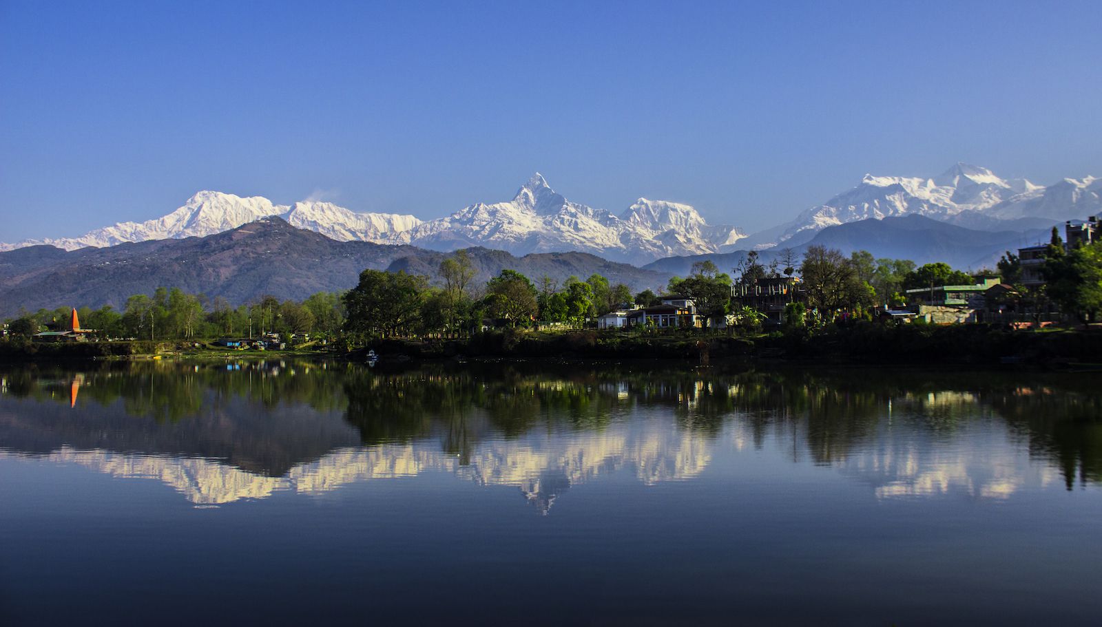Reflections of the Annapurna Himalayan Range on Phewa Lake, Pokhara, Nepal