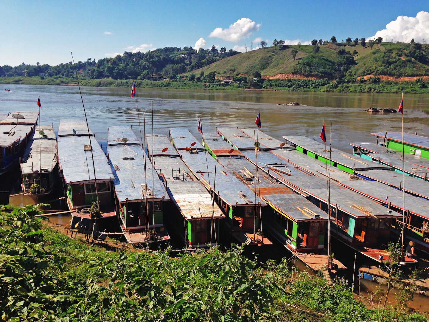 Slow boats parked at the Huay Xai border in Laos