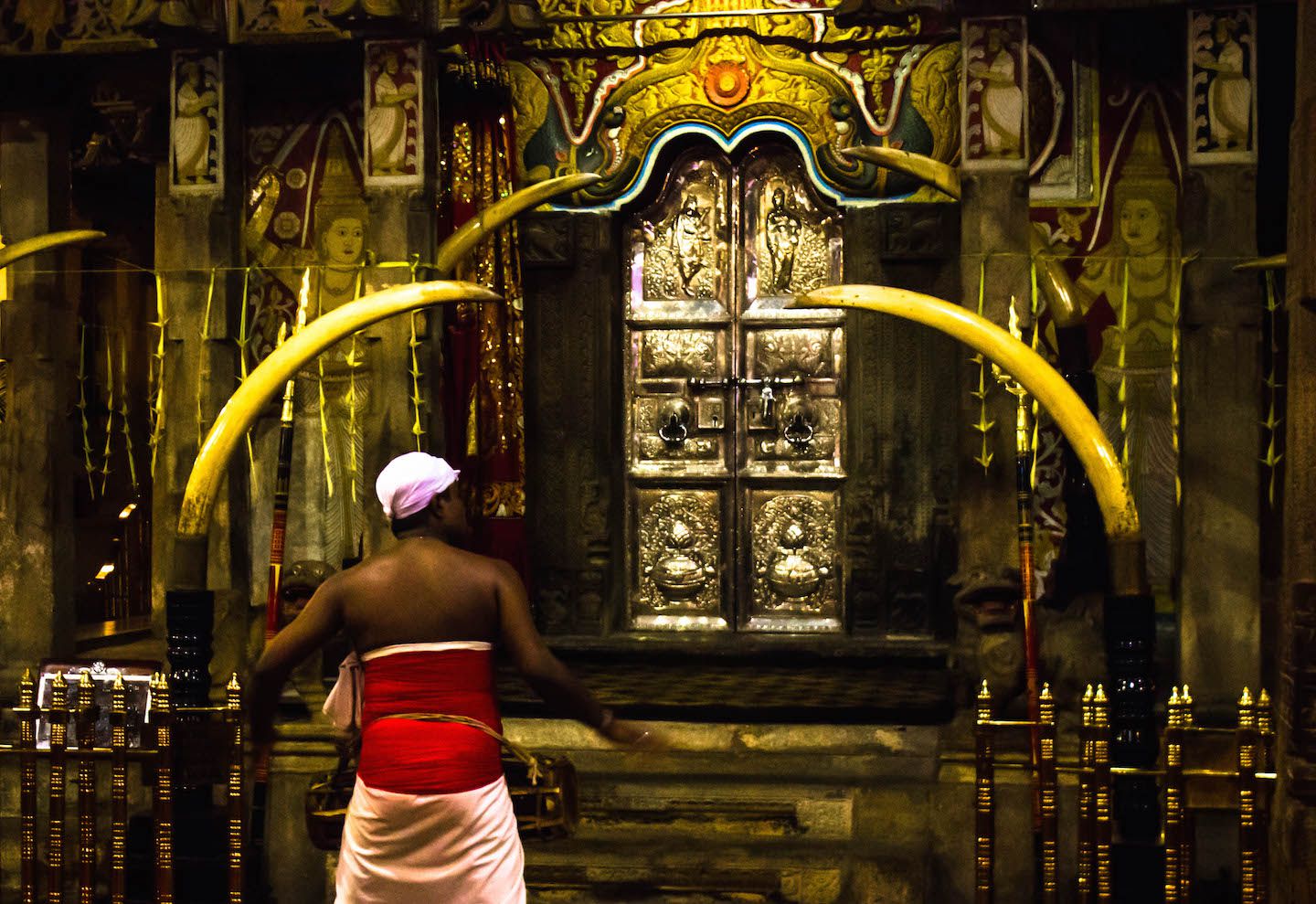 Local playing the drums at the Temple of the Tooth, Kandy, Sri Lanka