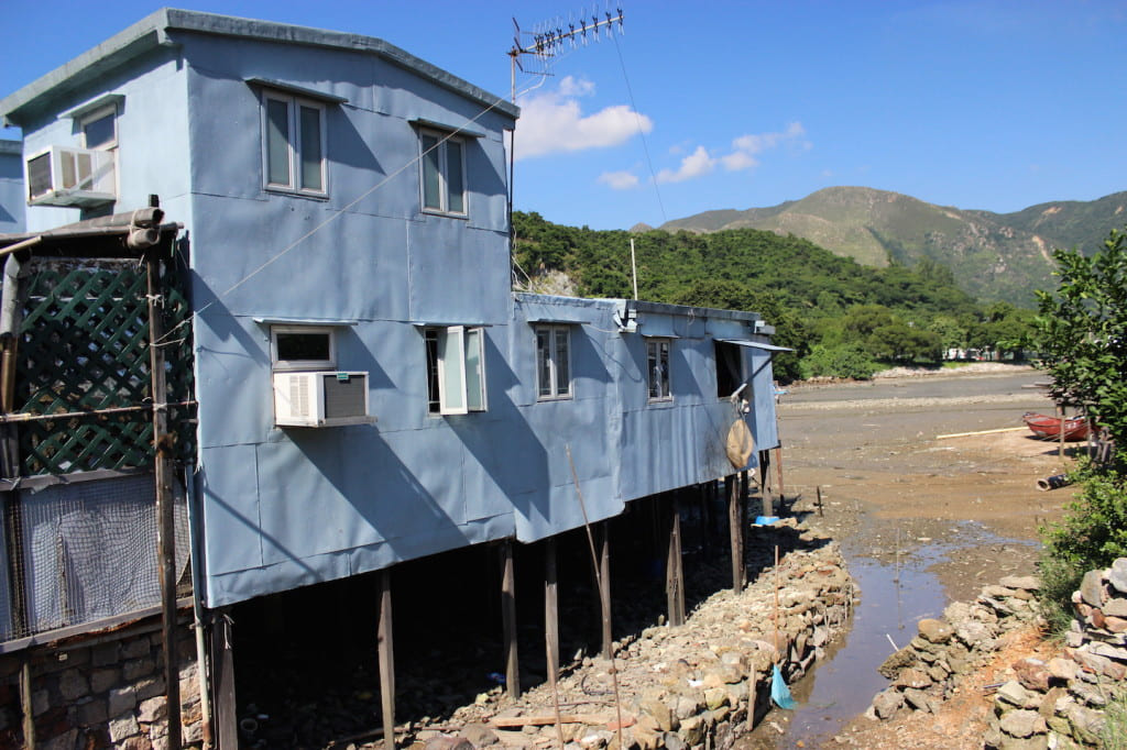 Stilt houses in Tai O covered in aluminum.