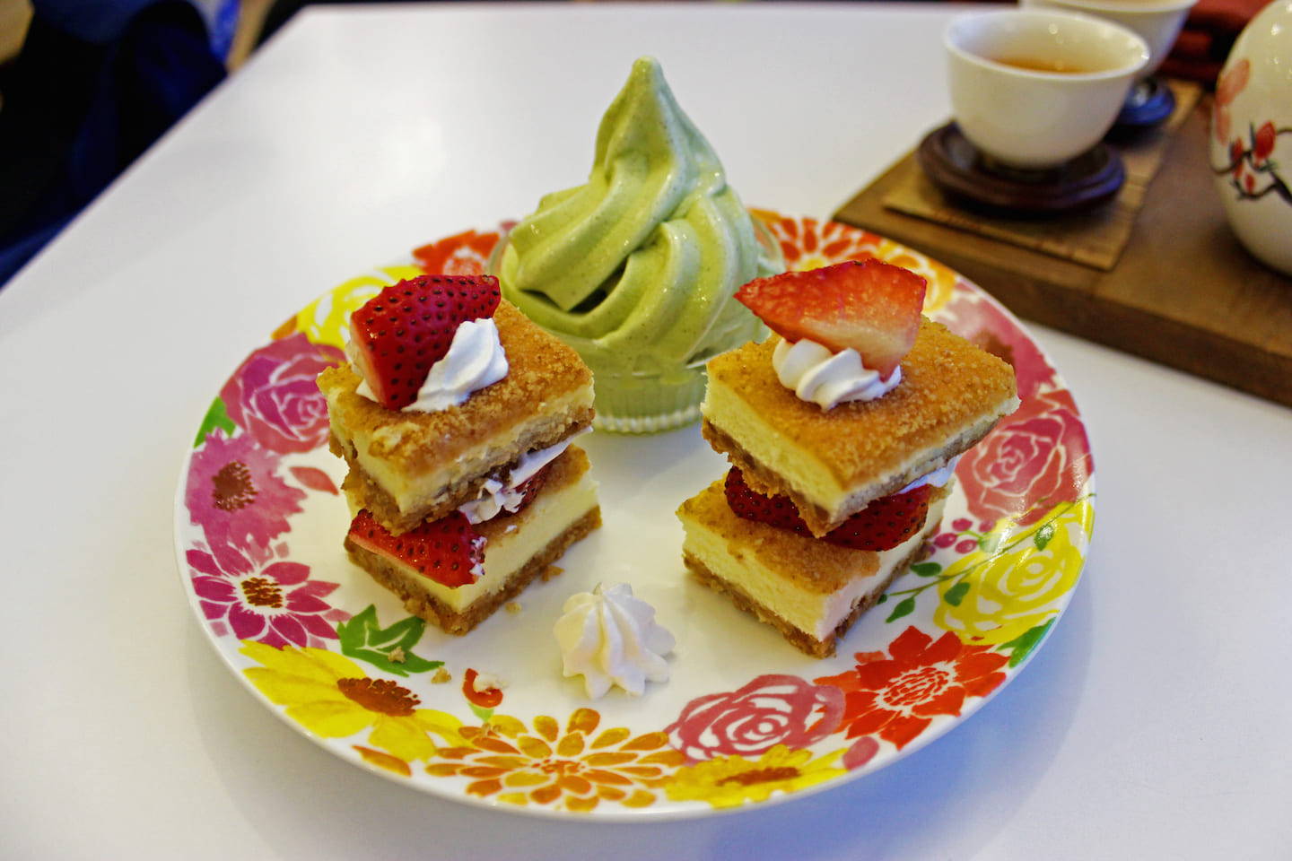 Strawberry cheesecake with green tea ice cream at Maokong Teahouse.